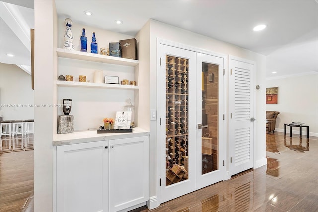 20230 NW 7th St, Pembroke Pines, FL 33029 - wine cellar with wood finished floors, recessed lighting, bar area, and baseboards