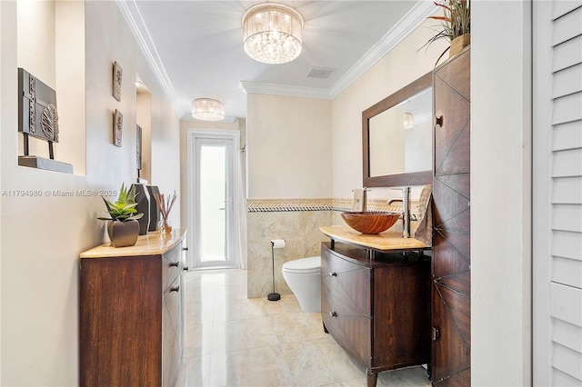 20230 NW 7th St, Pembroke Pines, FL 33029 - bathroom with ornamental molding, a chandelier, vanity, and tile walls
