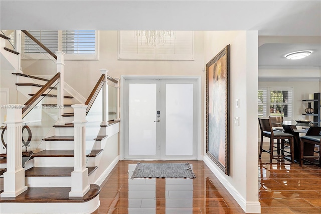 20230 NW 7th St, Pembroke Pines, FL 33029 - foyer with stairway, wood finished floors, baseboards, a chandelier, and ornamental molding