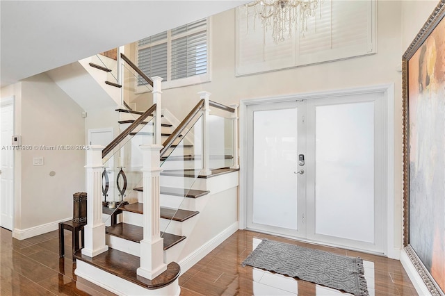 20230 NW 7th St, Pembroke Pines, FL 33029 - entryway featuring stairs, baseboards, wood finished floors, and a chandelier