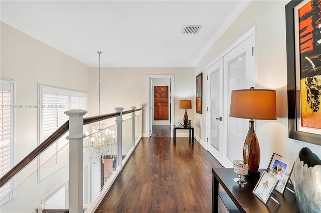 20230 NW 7th St, Pembroke Pines, FL 33029 - corridor with an upstairs landing, dark wood-style flooring, crown molding, a chandelier, and baseboards