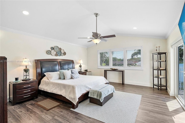 20230 NW 7th St, Pembroke Pines, FL 33029 - bedroom featuring wood finished floors, multiple windows, baseboards, vaulted ceiling, and crown molding
