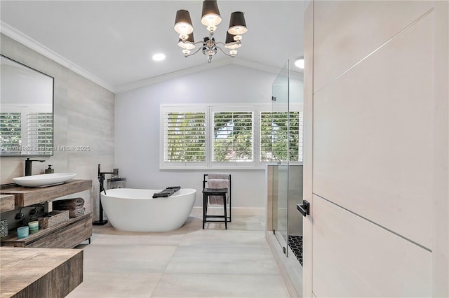 20230 NW 7th St, Pembroke Pines, FL 33029 - bathroom featuring a stall shower, a soaking tub, vanity, a chandelier, and crown molding