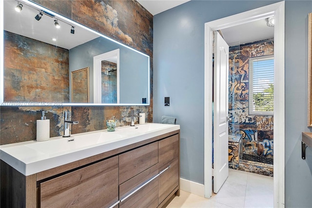 20230 NW 7th St, Pembroke Pines, FL 33029 - full bathroom with double vanity, tile patterned floors, and backsplash