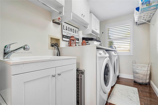 20230 NW 7th St, Pembroke Pines, FL 33029 - laundry room with cabinet space, washer and dryer, baseboards, and dark wood finished floors