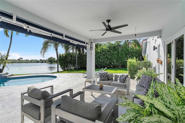 20230 NW 7th St, Pembroke Pines, FL 33029 - view of patio / terrace with outdoor lounge area, a water view, a ceiling fan, and an outdoor pool