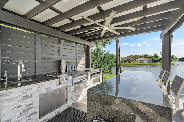 20230 NW 7th St, Pembroke Pines, FL 33029 - view of patio with an outdoor kitchen, a water view, and a ceiling fan