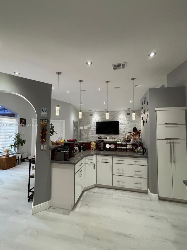 14530 SW 123rd Ct, Miami, FL 33186 - kitchen featuring dark countertops, recessed lighting, pendant lighting, white cabinets, and decorative backsplash