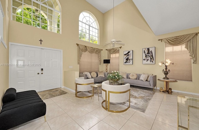 7600 Belmonte Blvd, Margate, FL 33063 - tiled living room with high vaulted ceiling, baseboards, and ceiling fan