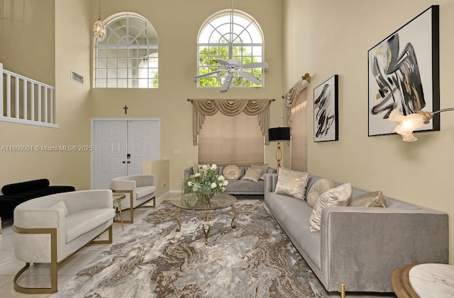 7600 Belmonte Blvd, Margate, FL 33063 - living room with ceiling fan and a high ceiling
