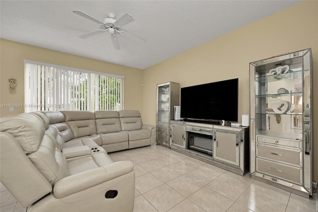 7600 Belmonte Blvd, Margate, FL 33063 - living area with light tile patterned floors, a ceiling fan, and a textured ceiling