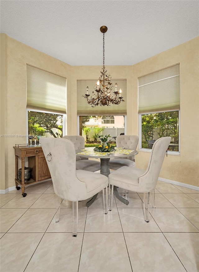 7600 Belmonte Blvd, Margate, FL 33063 - dining space with a chandelier, healthy amount of natural light, and light tile patterned floors