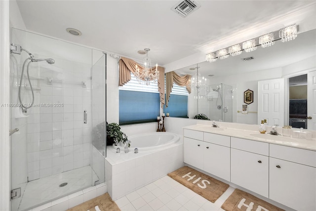 7600 Belmonte Blvd, Margate, FL 33063 - bathroom with a chandelier, a stall shower, a bath, double vanity, and tile patterned floors