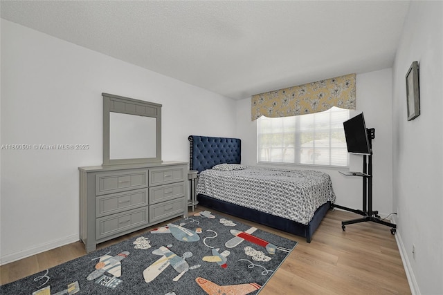 7600 Belmonte Blvd, Margate, FL 33063 - bedroom featuring wood finished floors and baseboards