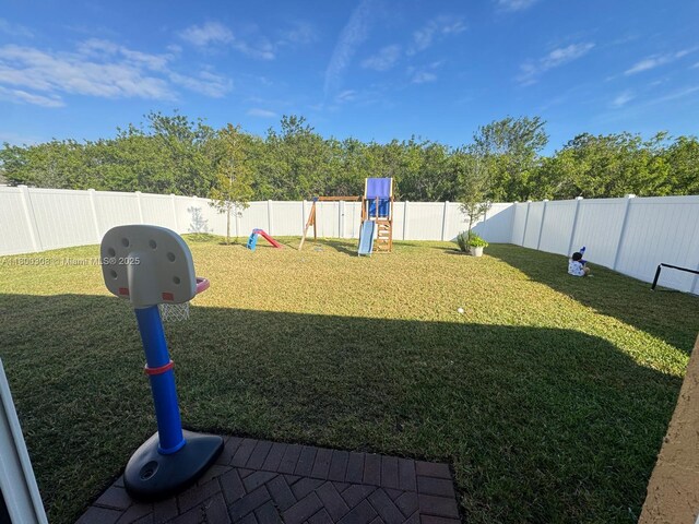 view of yard featuring a playground