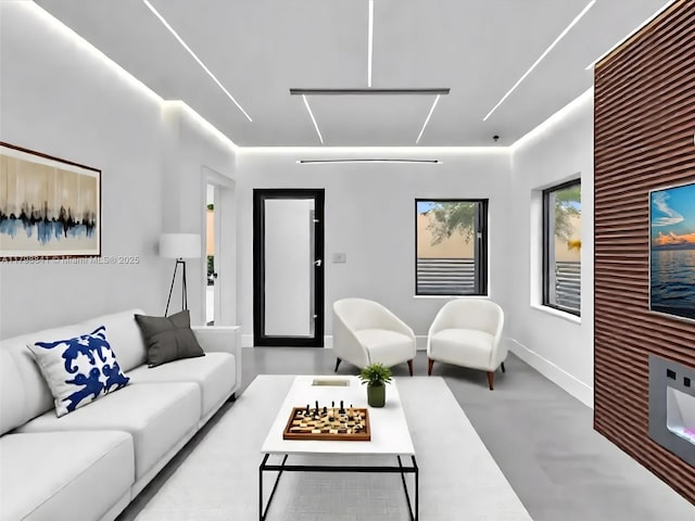 4921 NW 6th Ave, Miami, FL 33127 - living area featuring finished concrete floors and baseboards