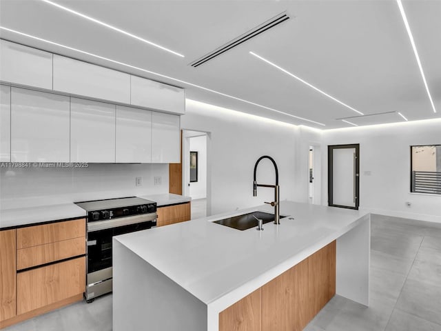 4921 NW 6th Ave, Miami, FL 33127 - kitchen featuring electric range, a sink, modern cabinets, and light countertops