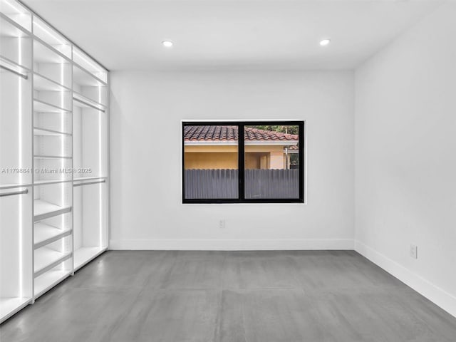 4921 NW 6th Ave, Miami, FL 33127 - unfurnished room with concrete floors, baseboards, and recessed lighting