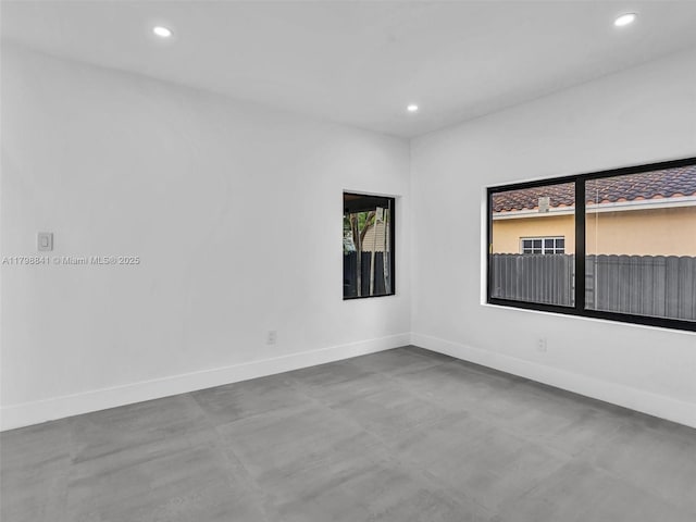 4921 NW 6th Ave, Miami, FL 33127 - unfurnished room with baseboards, recessed lighting, and finished concrete floors