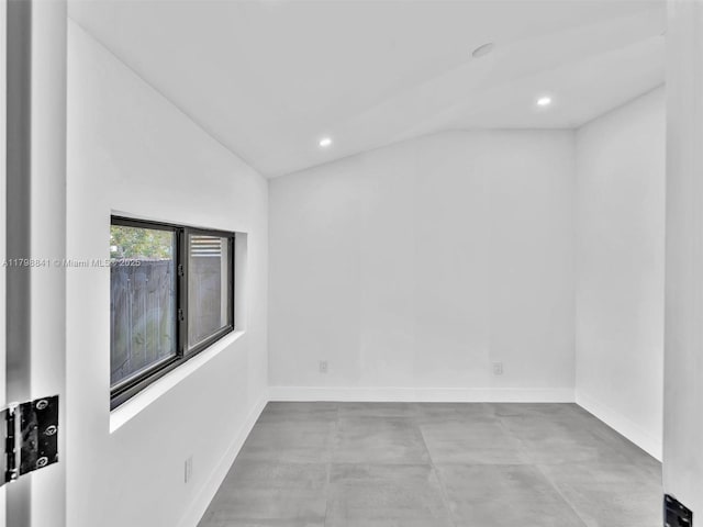 4921 NW 6th Ave, Miami, FL 33127 - spare room featuring lofted ceiling, concrete floors, recessed lighting, and baseboards