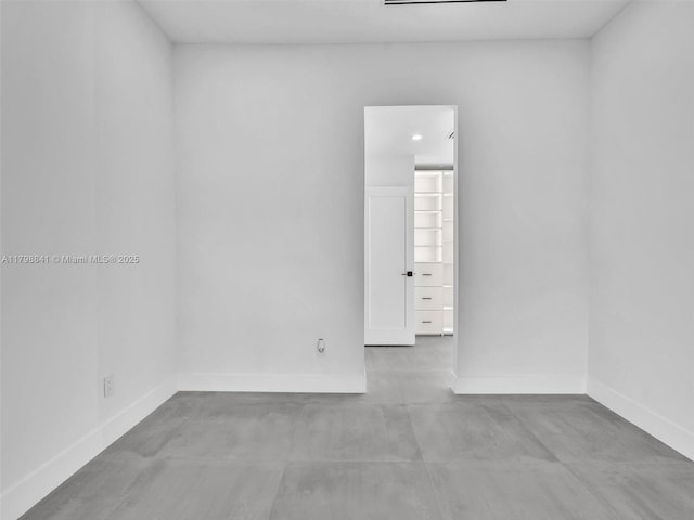 4921 NW 6th Ave, Miami, FL 33127 - spare room featuring baseboards and finished concrete floors