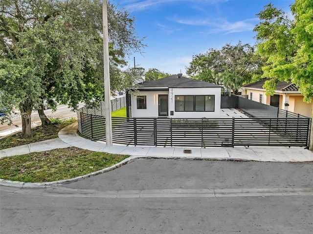 4921 NW 6th Ave, Miami, FL 33127 - view of front of property featuring a fenced front yard and stucco siding