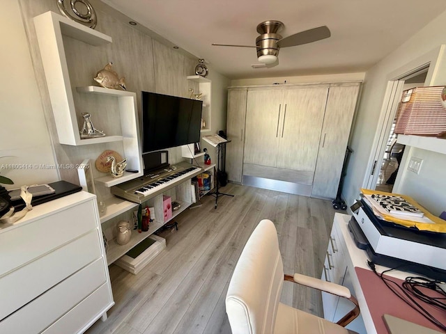 4909 Bayberry Ln, Tamarac, FL 33319 - living room featuring a ceiling fan and light wood-style flooring