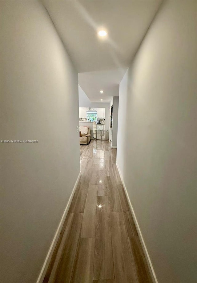 4909 Bayberry Ln, Tamarac, FL 33319 - corridor featuring wood finished floors and recessed lighting