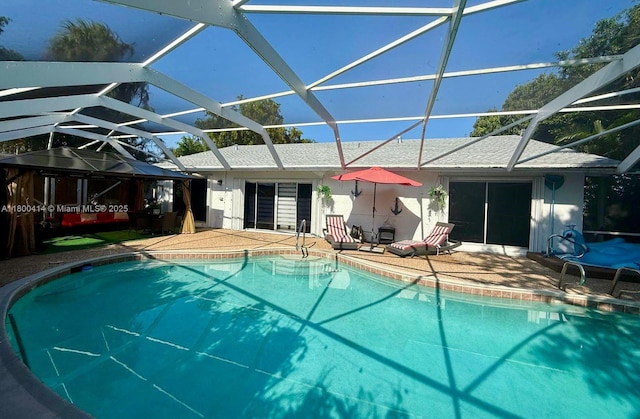 4909 Bayberry Ln, Tamarac, FL 33319 - swimming pool with a patio area, a gazebo, and glass enclosure
