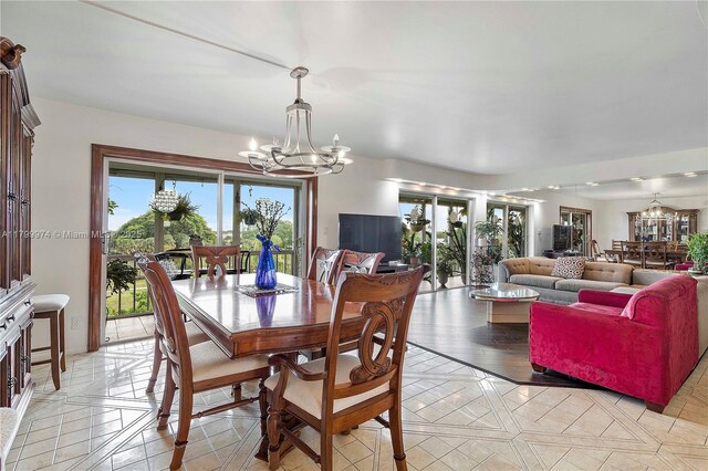4800 Hillcrest Ln Unit 503, Hollywood, FL 33021 - dining space with a chandelier