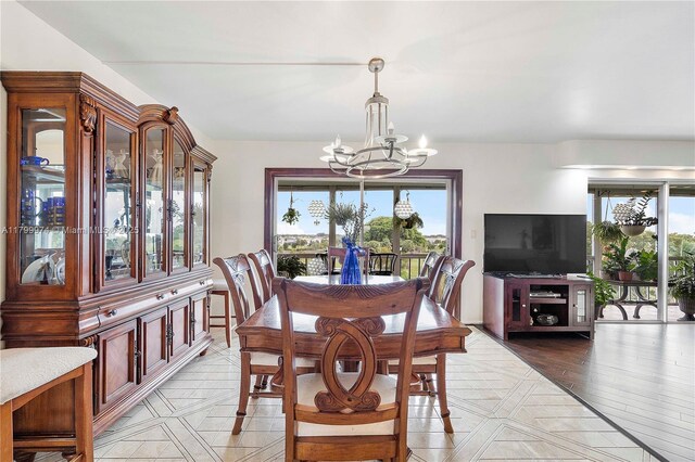 4800 Hillcrest Ln Unit 503, Hollywood, FL 33021 - dining area featuring a chandelier