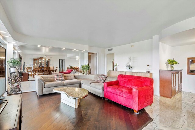4800 Hillcrest Ln Unit 503, Hollywood, FL 33021 - living room featuring a chandelier