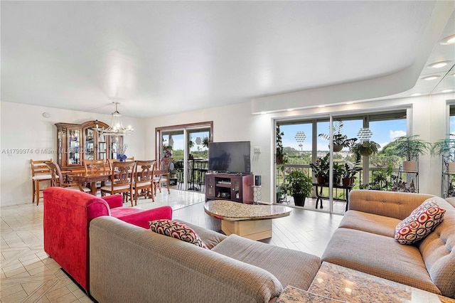 4800 Hillcrest Ln Unit 503, Hollywood, FL 33021 - living area with a chandelier