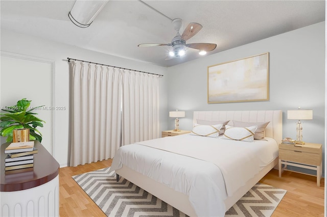4800 Hillcrest Ln Unit 503, Hollywood, FL 33021 - bedroom featuring light wood-style floors and ceiling fan