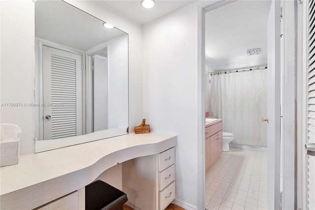 4800 Hillcrest Ln Unit 503, Hollywood, FL 33021 - bathroom with vanity, a closet, tile patterned floors, recessed lighting, and a shower with shower curtain