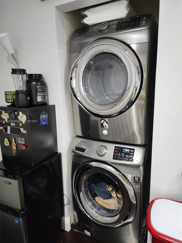 12430 SW 50th St Unit 147, Miramar, FL 33027 - laundry room featuring stacked washer and clothes dryer