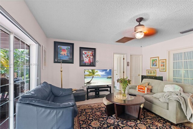 9905 SW 131st St, Miami, FL 33176 - living area with a textured ceiling and ceiling fan