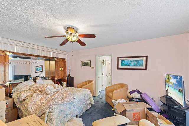 9905 SW 131st St, Miami, FL 33176 - carpeted bedroom featuring a textured ceiling and a ceiling fan