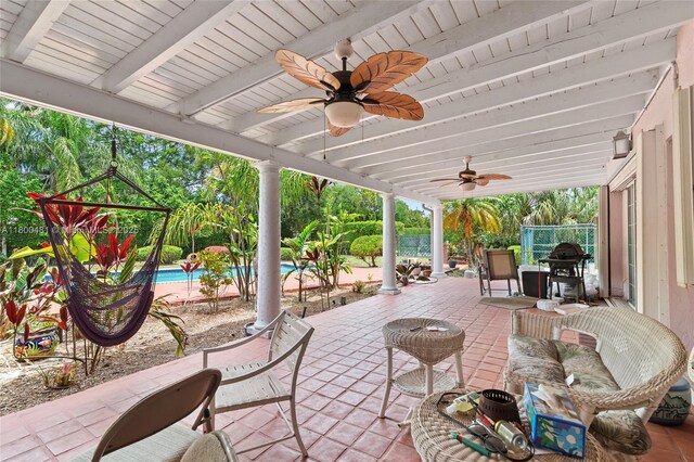 9905 SW 131st St, Miami, FL 33176 - view of patio featuring a ceiling fan, an outdoor pool, and fence