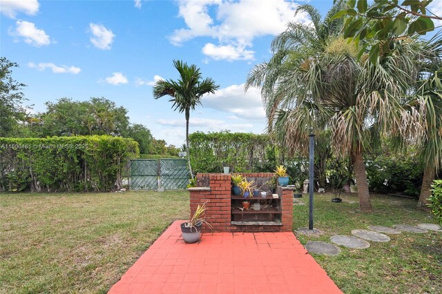 9905 SW 131st St, Miami, FL 33176 - view of yard featuring a patio area