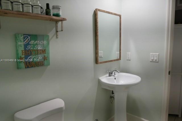 20600 SW 316th St, Homestead, FL 33030 - bathroom with toilet and a sink