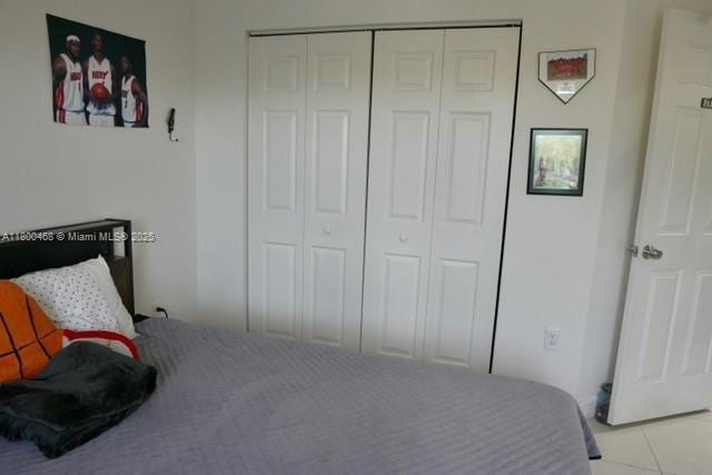 20600 SW 316th St, Homestead, FL 33030 - bedroom with a closet and light tile patterned flooring