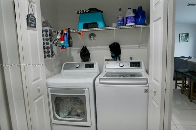 20600 SW 316th St, Homestead, FL 33030 - clothes washing area featuring separate washer and dryer and tile patterned floors