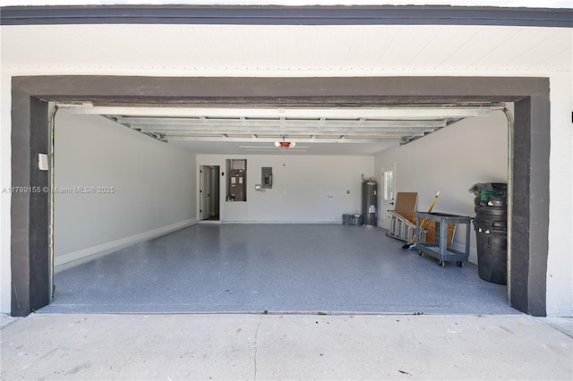 garage featuring electric water heater, electric panel, and a garage door opener