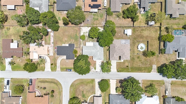 aerial view of property's location with nearby suburban area