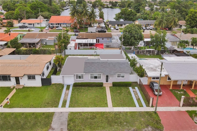 707 W 39th Pl, Hialeah, FL 33012 - aerial view of residential area featuring a nearby body of water