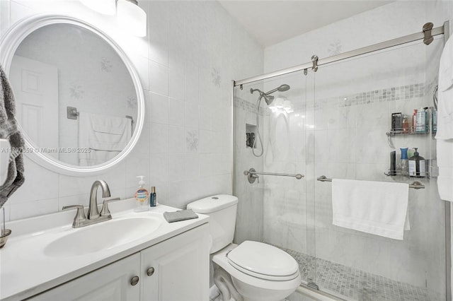 707 W 39th Pl, Hialeah, FL 33012 - full bathroom featuring tile walls, vanity, a shower stall, and backsplash