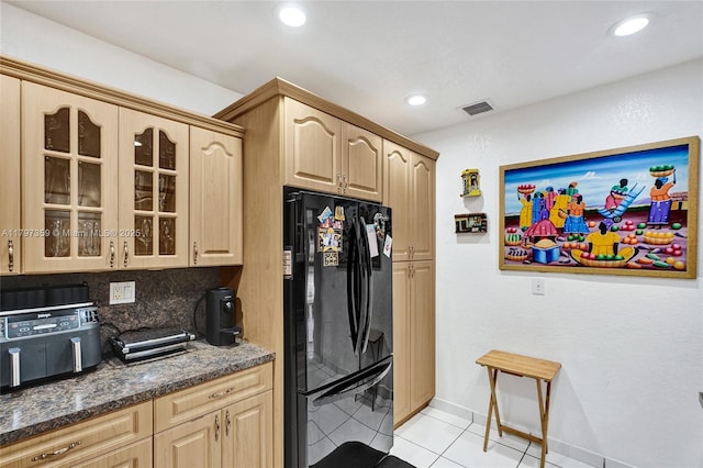 707 W 39th Pl, Hialeah, FL 33012 - kitchen with freestanding refrigerator, glass insert cabinets, light brown cabinetry, light tile patterned flooring, and recessed lighting