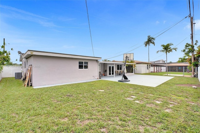 707 W 39th Pl, Hialeah, FL 33012 - rear view of property with stucco siding and a patio