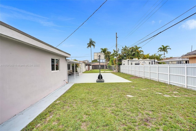 707 W 39th Pl, Hialeah, FL 33012 - fenced backyard with a patio